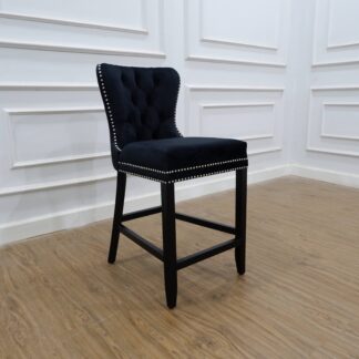 Tufted black velvet barstool